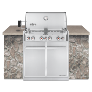 A Weber Summit S-460 Built-In with a stone counter top.