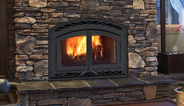 An Astria Montecito Estate Wood Burning Fireplace in a living room.