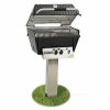 A Broilmaster Premium P4X Gas BBQ With In-Ground Post Mount on a stand with grass in the background.