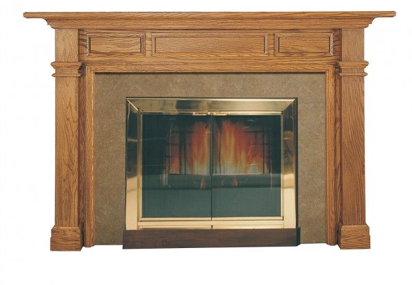 A fireplace with a TM Colonial Wood Mantel Surround and a fireplace insert.