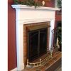 A Stoll Fireplace Hood with a mantle and a mantle.