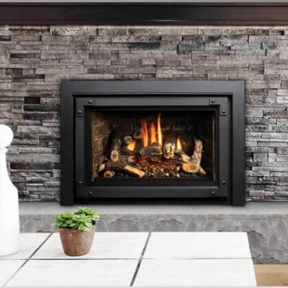 A gas fireplace in a living room.