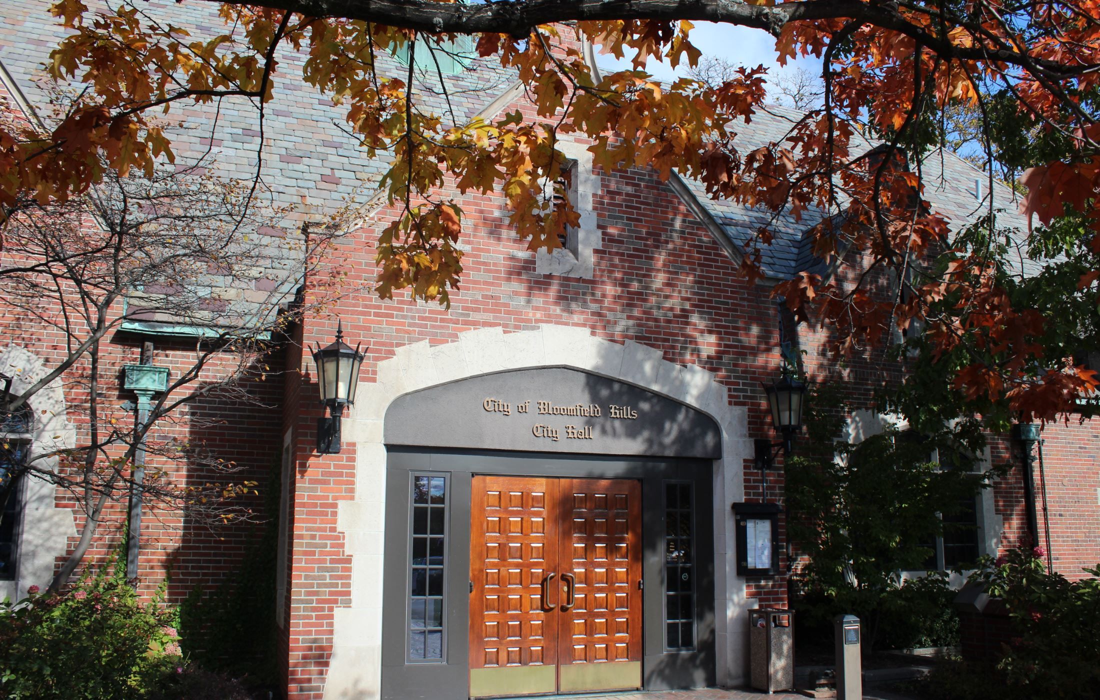 A brick building with a wooden door.