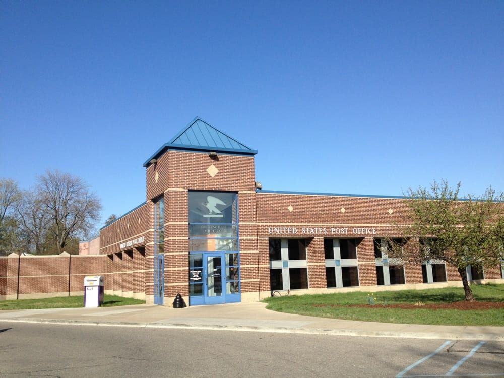 A building with a blue roof and a blue door.